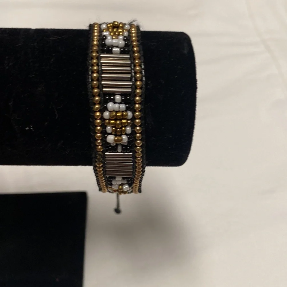Gold black white and silver beads on black cord Adjustable Size Bracelet. - Picture 2 of 5